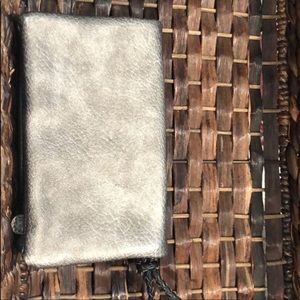 Metallic silver wristlet